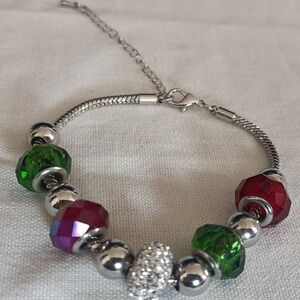 Elegant Silver Bracelet with Red and Green Accents